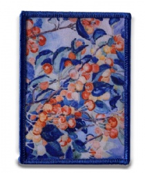 Printed badge with merrowed border